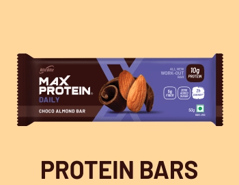 Assorted Indian protein bars displayed on a table with visible nutrition labels
