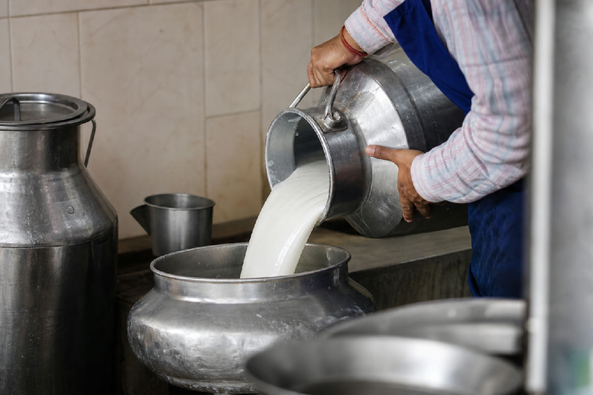 Dodla Dairy detergent milk: what the FSSAI case actually says — editorial illustration for Dodla Dairy Detergent Milk Case: What FSSAI’s Allegation Means