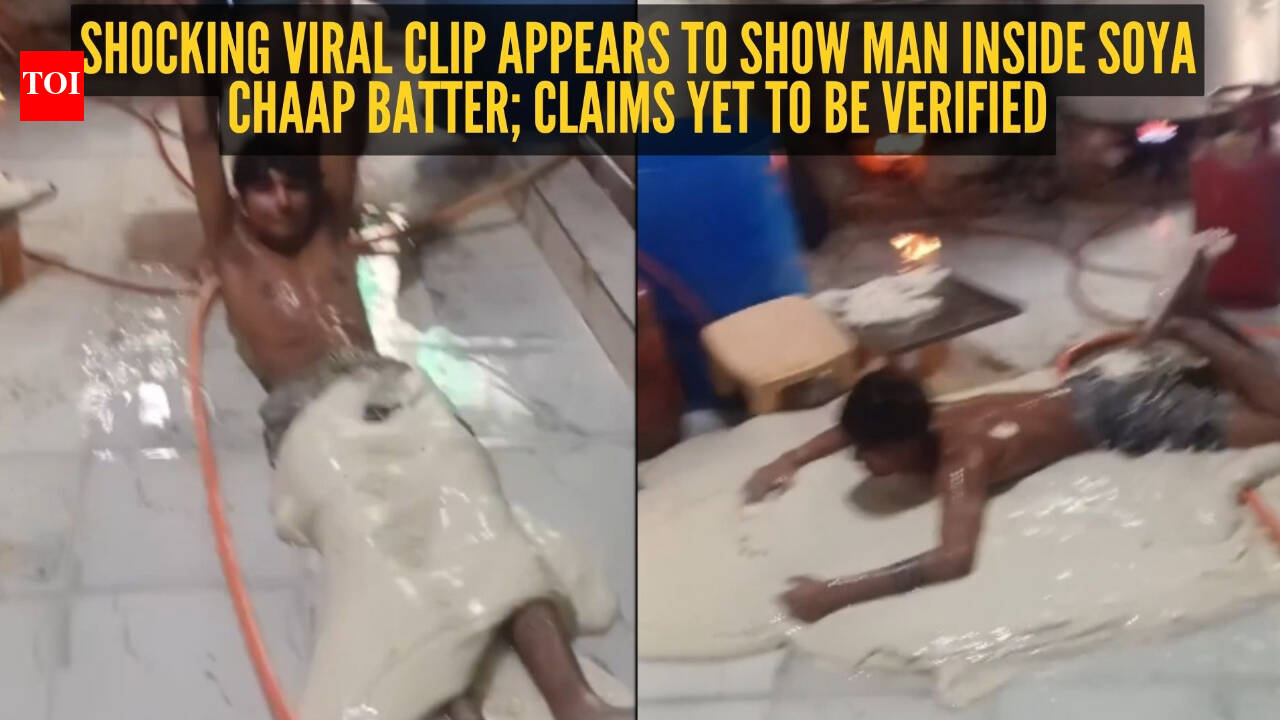 Still from TV news segment about viral soya chaap factory video showing worker near dough
