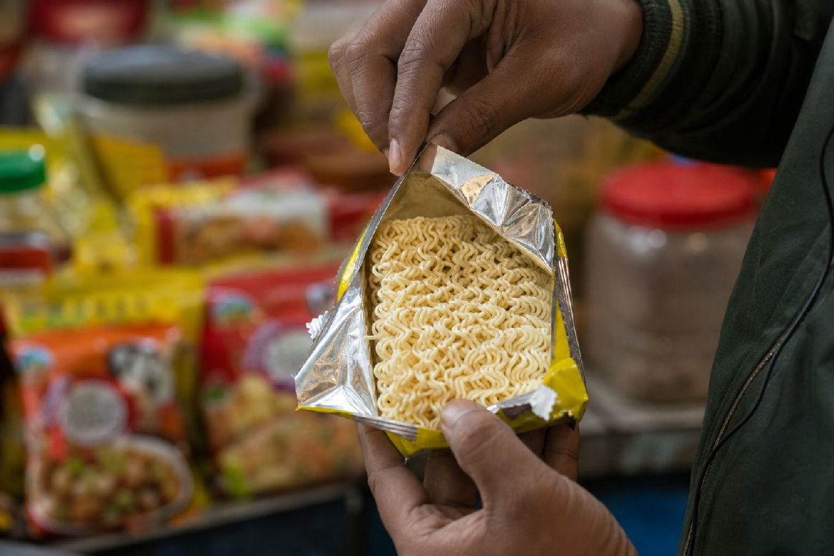 Worms in Maggi packet: what the viral video actually establishes — editorial illustration for Worms in Maggi Packet: What Nestlé Has Confirmed So Far