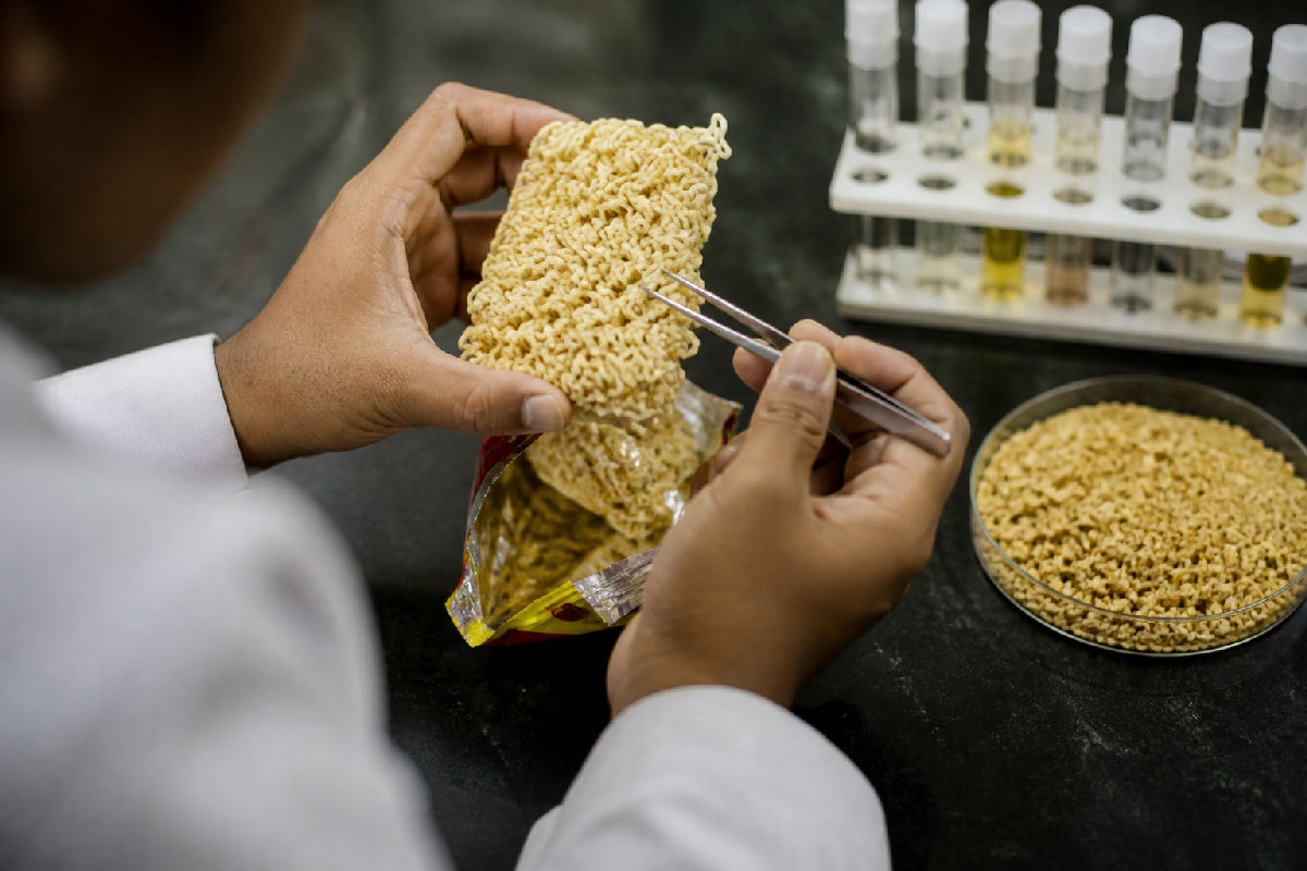 Nestlé Maggi insect complaint: what Nestlé has confirmed — editorial illustration for Worms in Maggi Packet: What Nestlé Has Confirmed So Far